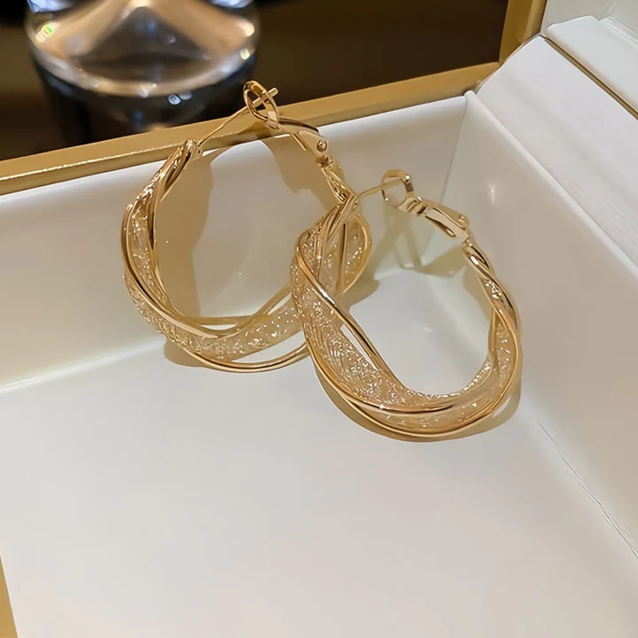🔥 Sconto del 50% - - 🎁Orecchini intrecciati alla moda