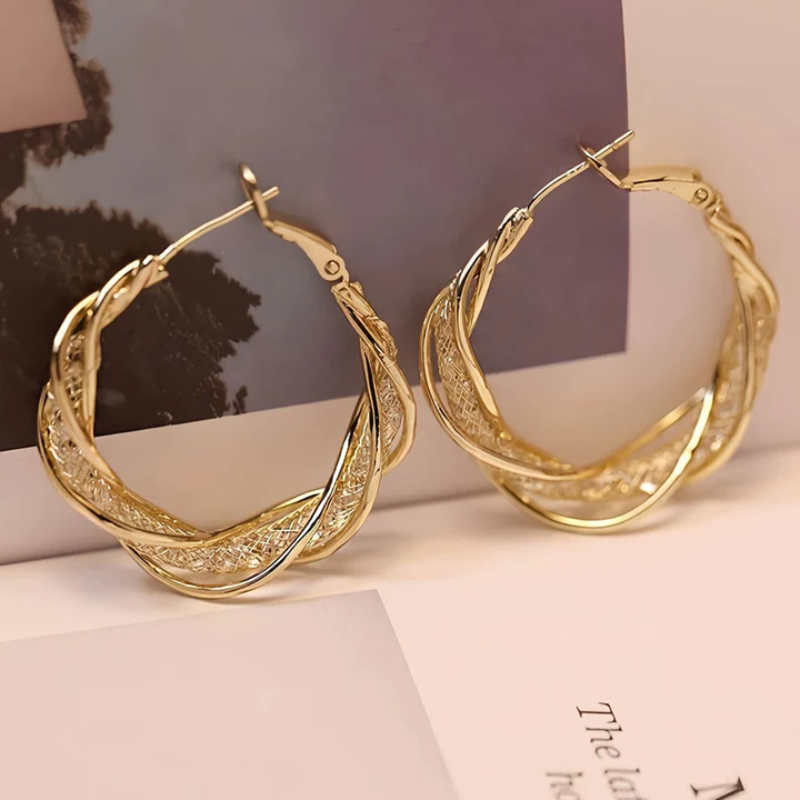 🔥 Sconto del 50% - - 🎁Orecchini intrecciati alla moda