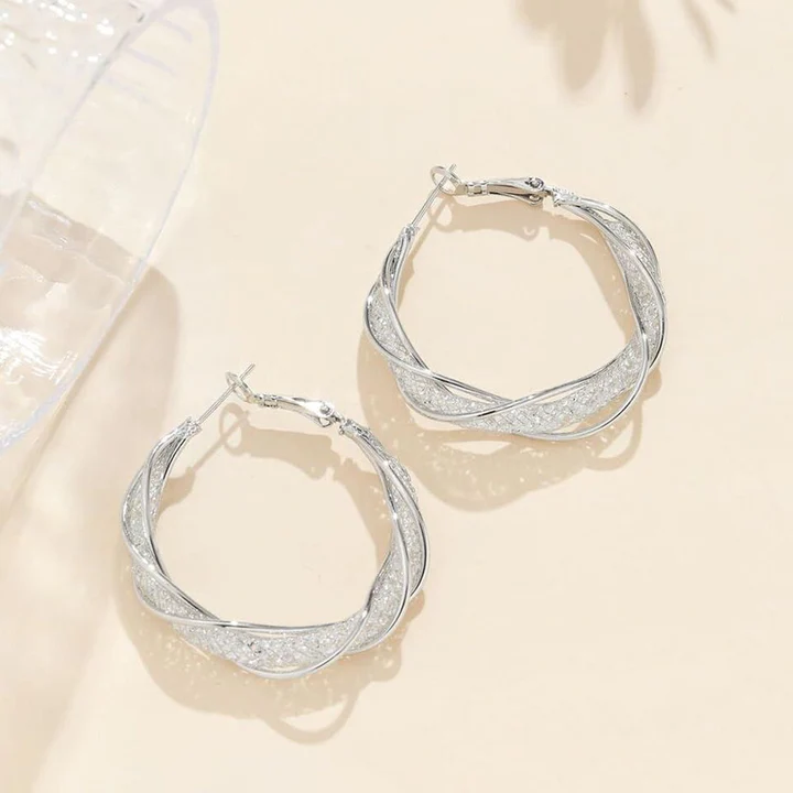 🔥 Sconto del 50% - - 🎁Orecchini intrecciati alla moda