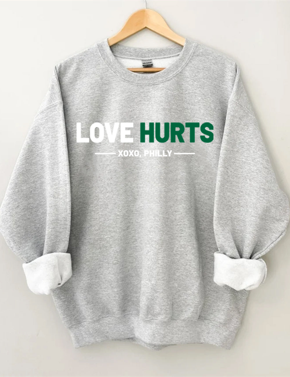 Love Hurts No One Like Us We Don't Care Eagles Football Sweatshirt
