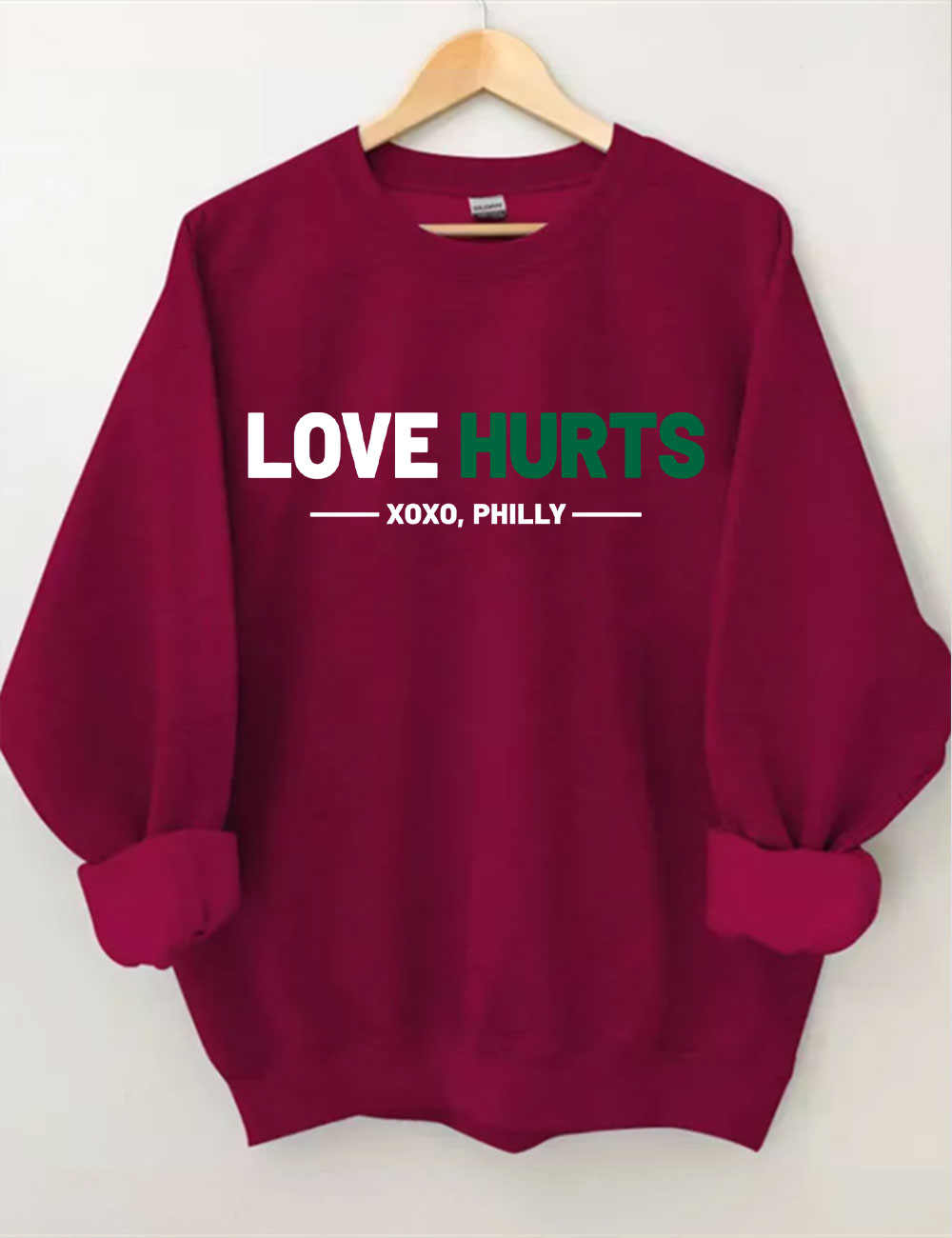 Love Hurts No One Like Us We Don't Care Eagles Football Sweatshirt