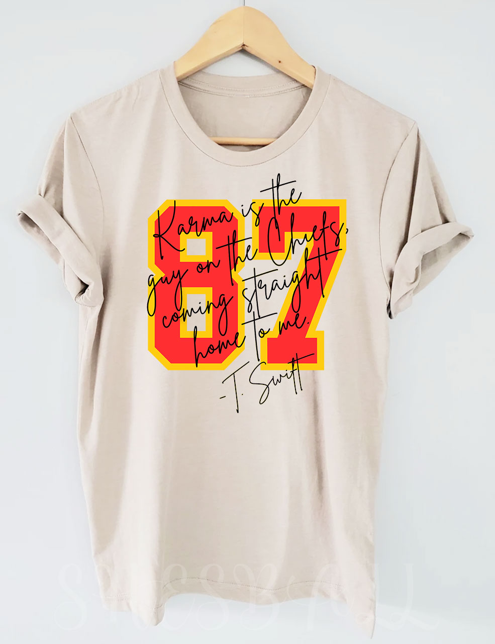 Karma is the guy on the chiefs T-Shirt