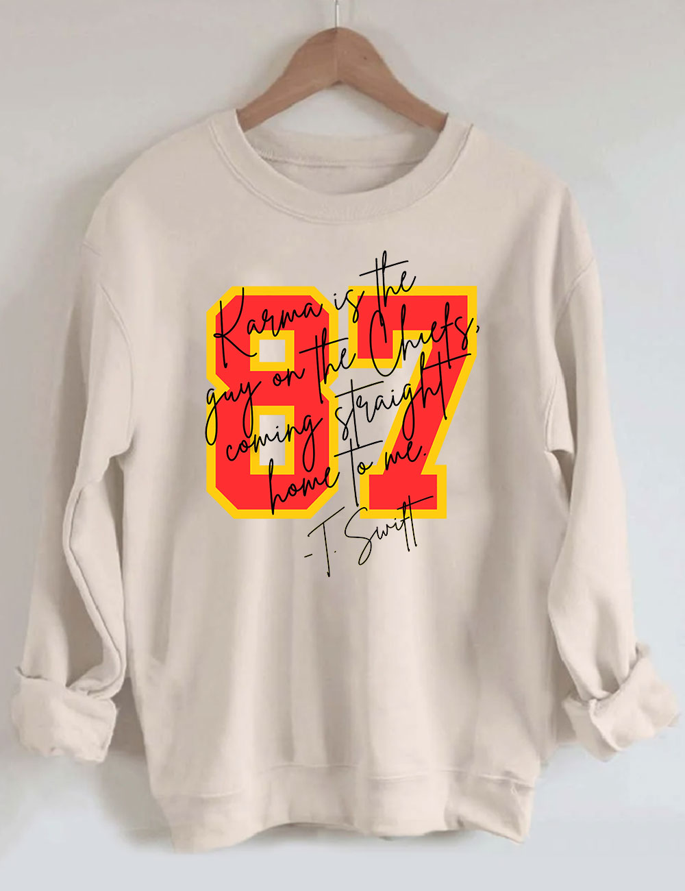 Karma is the guy on the chiefs Sweatshirt