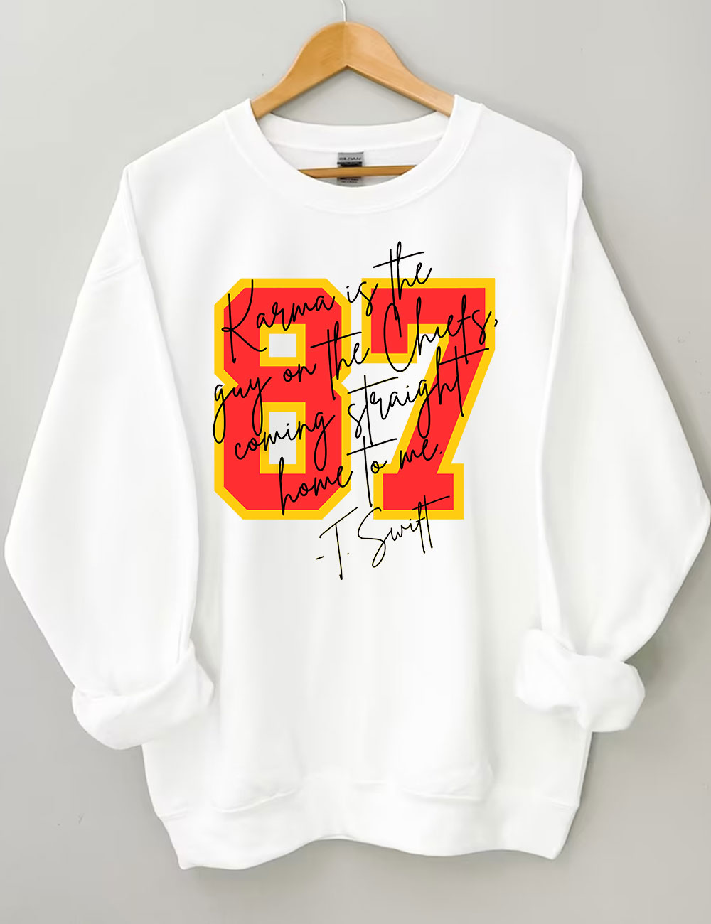 Karma is the guy on the chiefs Sweatshirt