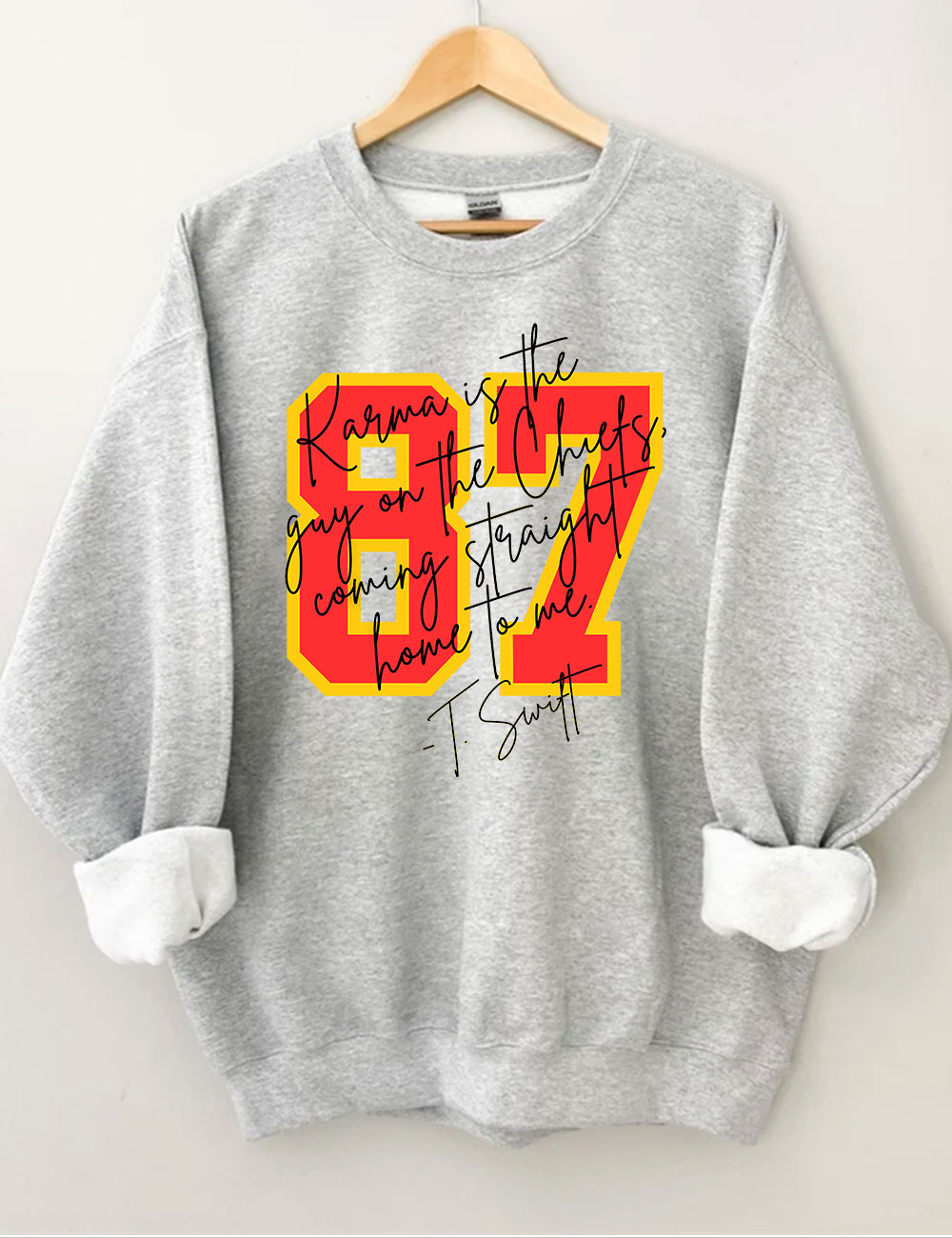 Karma is the guy on the chiefs Sweatshirt