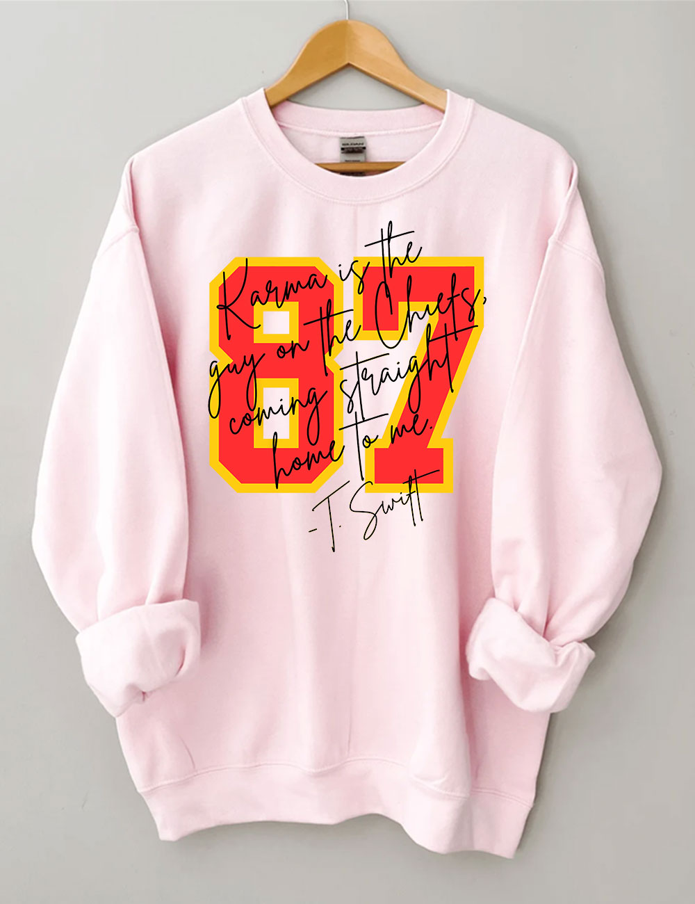 Karma is the guy on the chiefs Sweatshirt