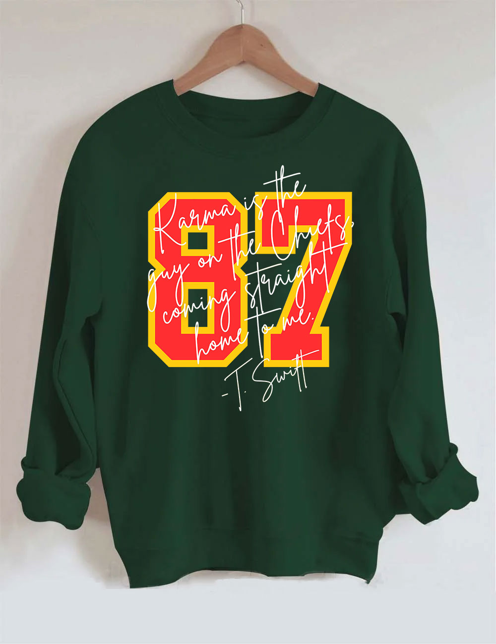 Karma is the guy on the chiefs Sweatshirt