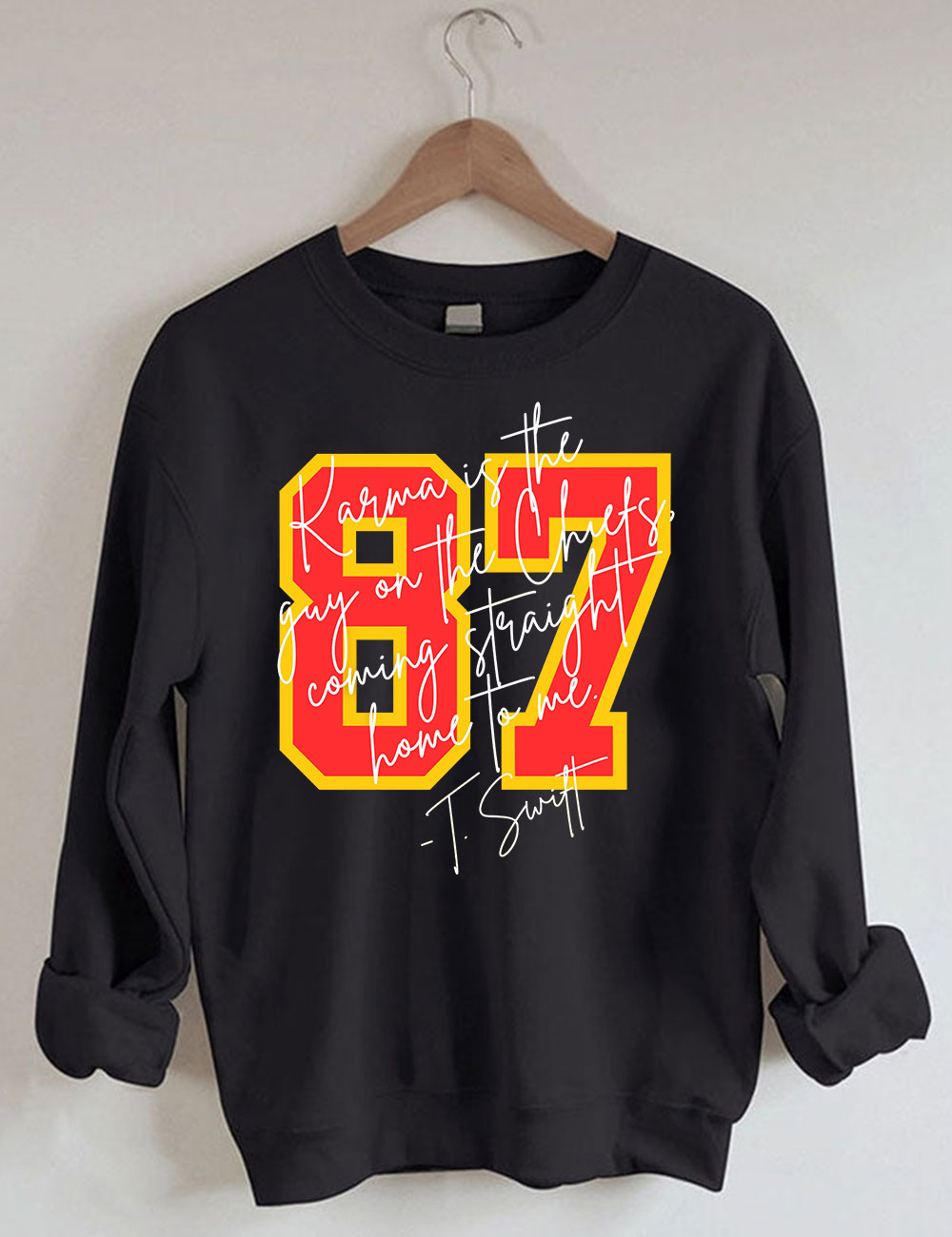 Karma is the guy on the chiefs Sweatshirt