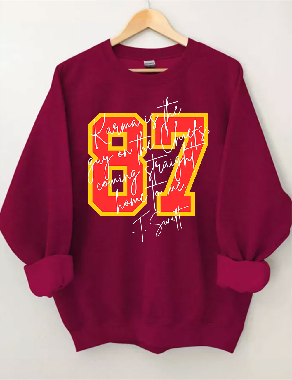 Karma is the guy on the chiefs Sweatshirt