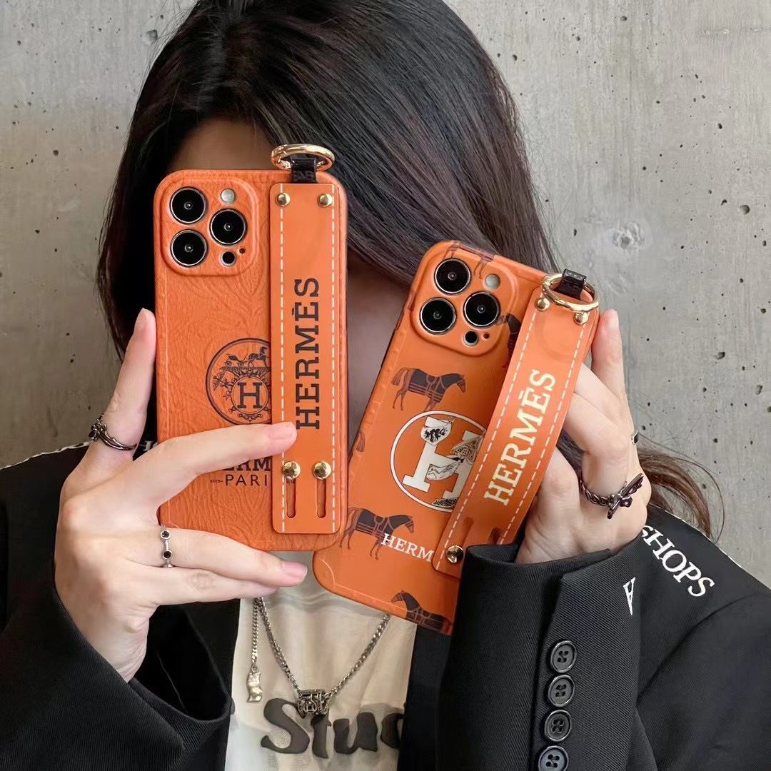 Etui na telefon Hermès z opaską na nadgarstek