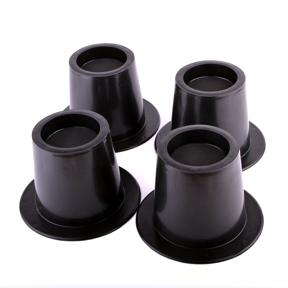 Osalis Home Help Set of 4 Chair Raisers - Set of four black plastic chair raisers designed to increase furniture height, helping elderly or mobility-impaired users sit down and stand up more easily while improving stability and safety at home.