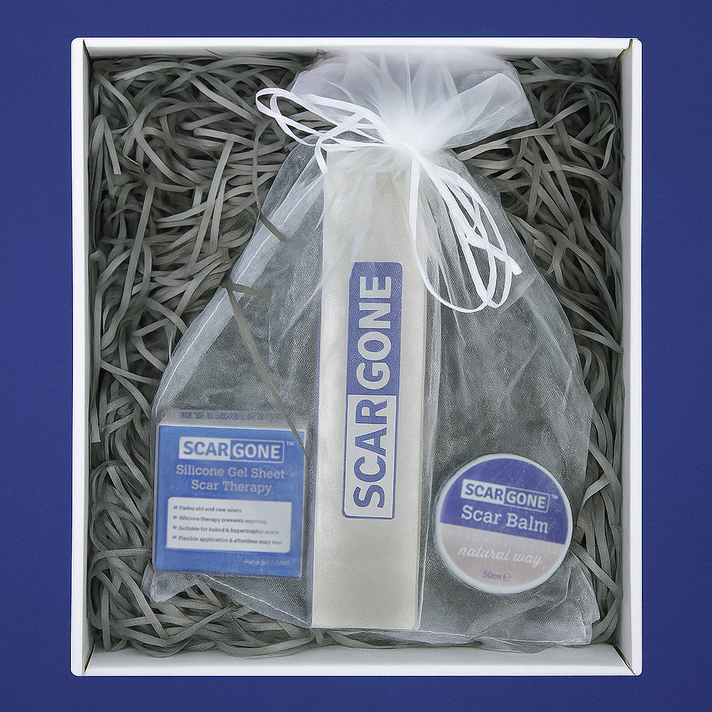 ScarGone premium scar care gift set featuring silicone gel sheet therapy, natural scar balm and scar management massager in a gift-ready presentation box