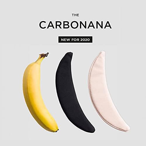Shreddies The Carbonana flatulence-filtering cushion displayed alongside a banana for size comparison, showing black and nude versions of the banana-shaped activated carbon cushion designed for discreet odour control when seated.