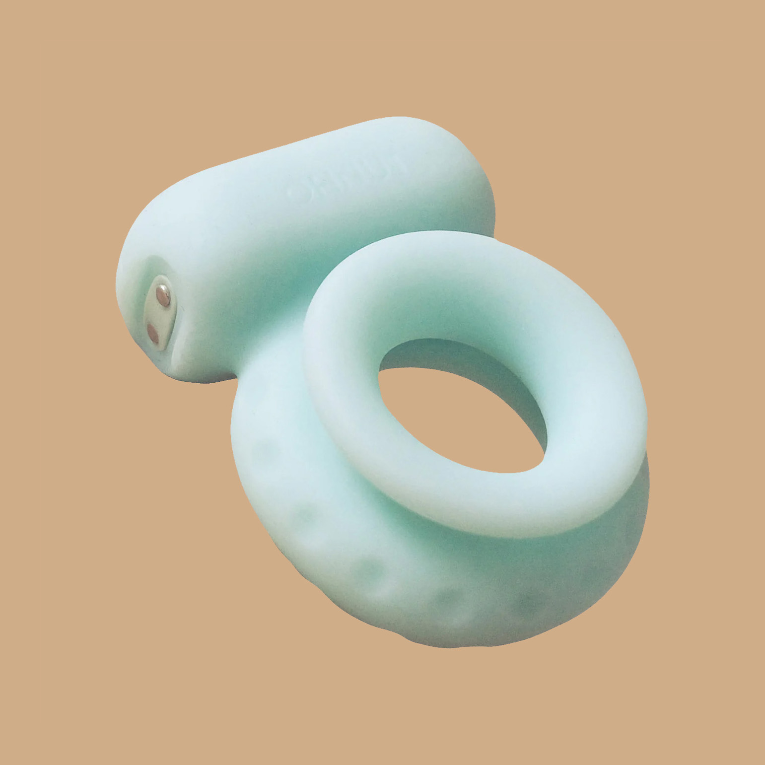 Ohnut Vibrating Ring shown in soft, flexible, body-safe silicone with a compact built-in motor. Designed to provide gentle vibration for added comfort, relaxation, and pleasure, supporting intimacy with or without Ohnut buffer rings.