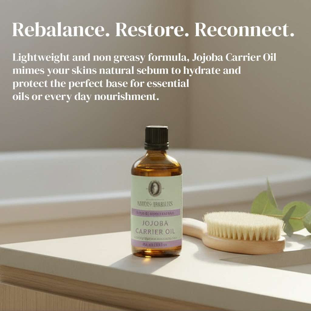 Napiers Jojoba Carrier Oil bottle displayed in a calm bathroom setting with natural accessories, highlighting lightweight, non-greasy jojoba oil that mimics the skin’s natural sebum, ideal for daily nourishment and as a base for essential oils.