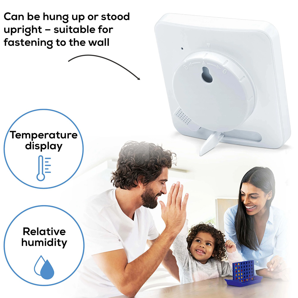 Beurer HM 22 thermo hygrometer shown with rear stand and wall-mount option, displaying temperature and relative humidity icons, suitable for wall hanging or tabletop use in homes to monitor indoor air quality and family comfort.