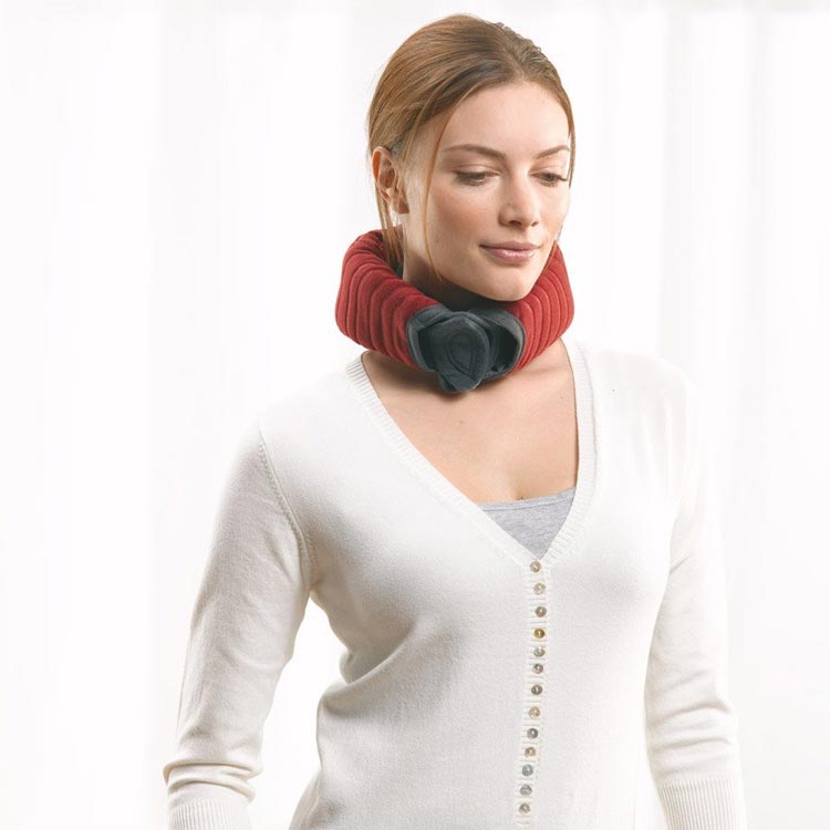 Beurer HK55 heat pad rolled for neck use, providing targeted warmth and gentle support. The flexible design delivers soothing heat to relieve neck tension and stiffness while staying comfortably in place for hands-free relaxation.