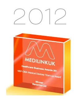 Text graphic showing the years 2012-2013, representing the period being discussed in StressNoMore’s company history. Medilink UK Healthcare Business Award trophy recognising Savantini Ltd as the winner of the NSF–DBA Medical Devices ‘Start-Up Award 