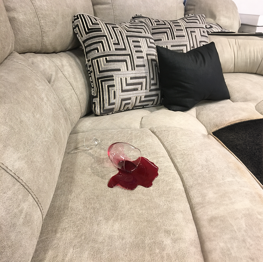  Professional Strength Carpet & Upholstery Stain Remover can remove Red wine spills on a light fabric sofa. 