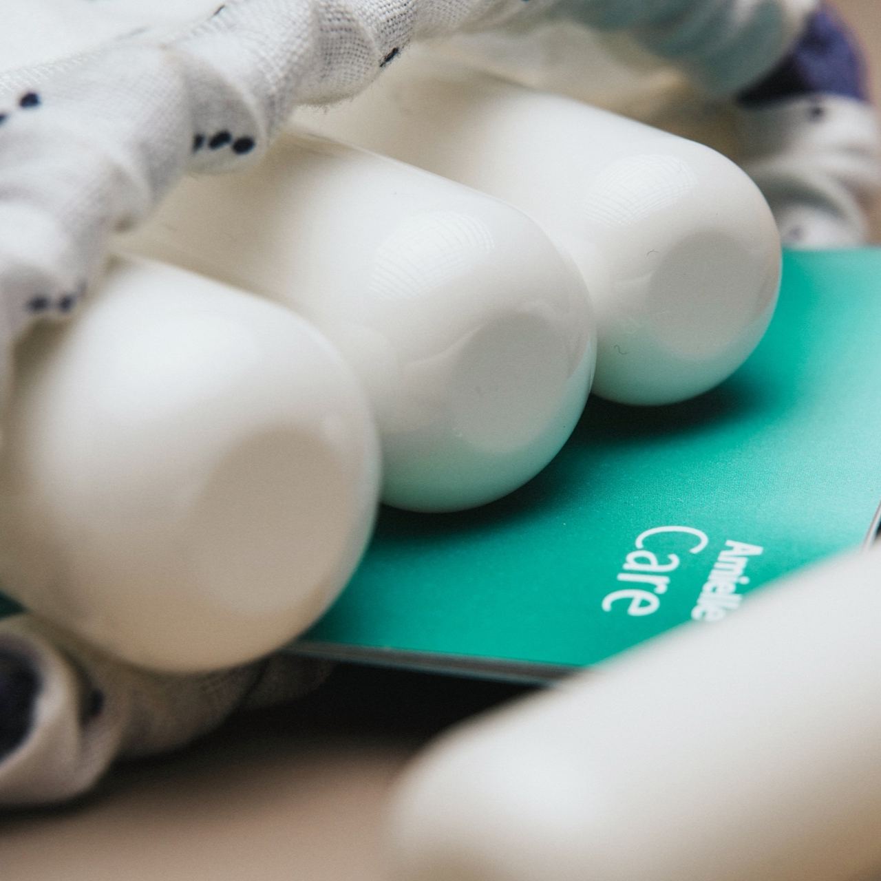 Amielle Care Vaginal Dilator Set Close-up of smooth white silicone dilators arranged in a storage pouch, showing rounded tips and graduated sizes, designed for comfortable dilation, pelvic floor therapy, and medical or personal use.