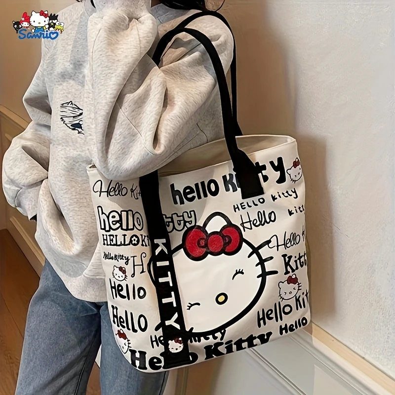 Hello Kitty ✨✨Τσάντα Tote από καμβά - Μεγάλη γυναικεία τσάντα αγορών με μακριές λαβές, κομψή τσάντα ώμου, ευρύχωρη καθημερινή τσάντα Tote, χαριτωμένη τσάντα παντοπωλείου, λευκή με ροζ τελείωμα, κλείσιμο με φερμουάρ, επένδυση από πολυεστέρα, σχέδιο με θέμα