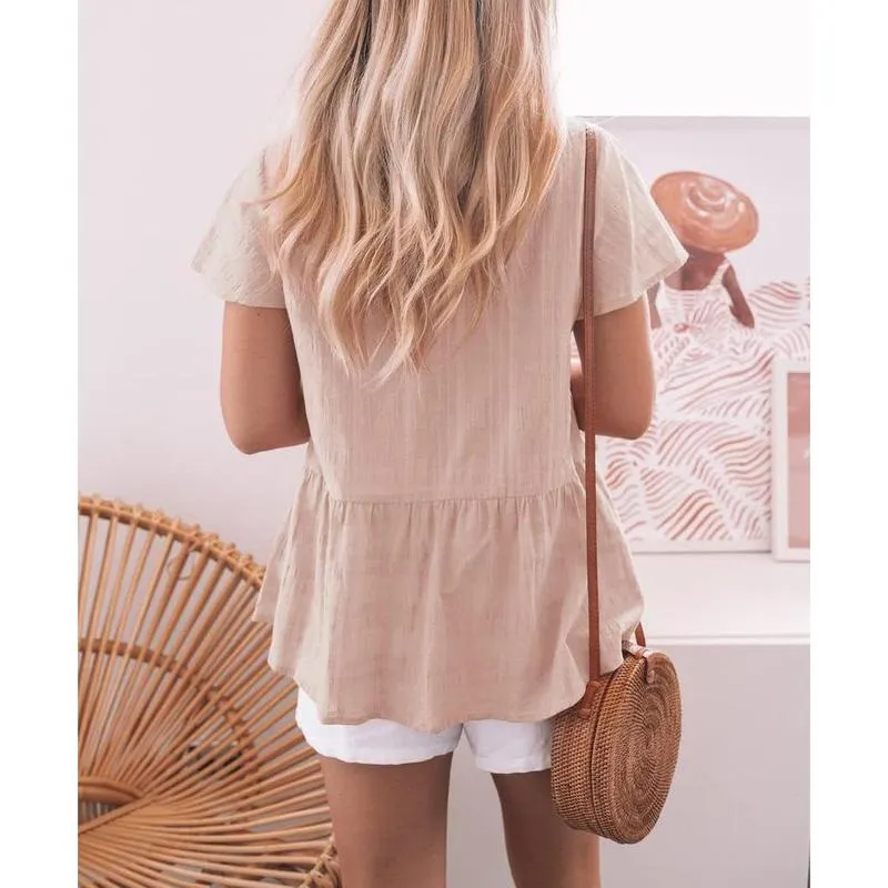 Women's short-sleeved V-neck shirt, button-down, loose and casual babydoll style with ruffled hem.