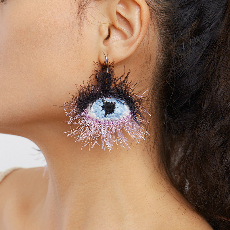 Purple furry eye earrings