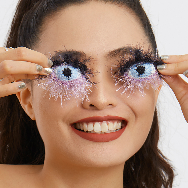 Purple furry eye earrings