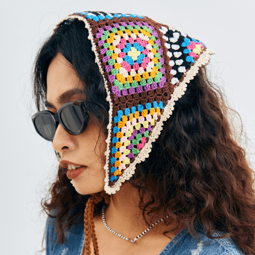 FeekyStore colorful crochet headscarf worn with sunglasses, highlighting a bold side profile and vibrant granny square details.