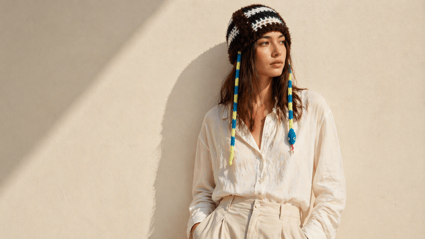 {"default":"model wearing handmade crochet hat in warm sunlight"}
