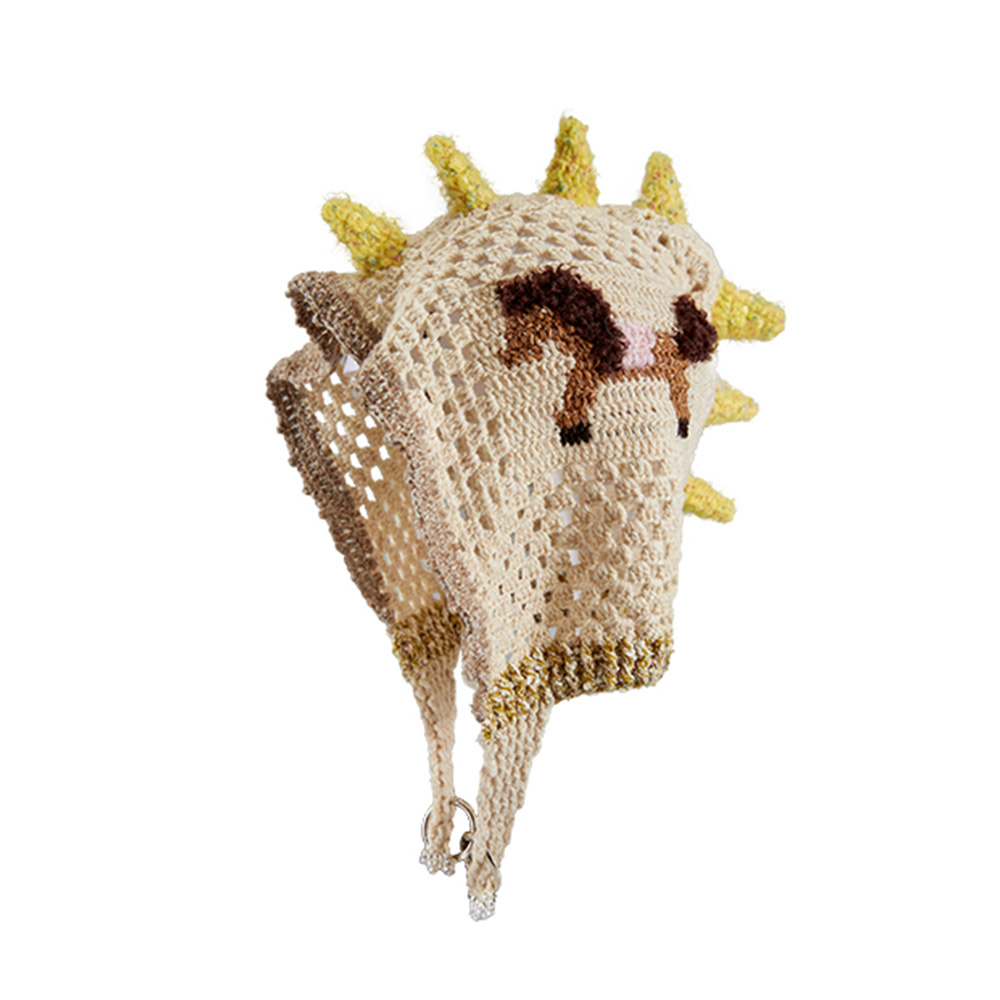 Isolated product image of the Unicorn Pony Crochet Hat against a clean background, featuring yellow spikes and a detailed brown pony pattern.