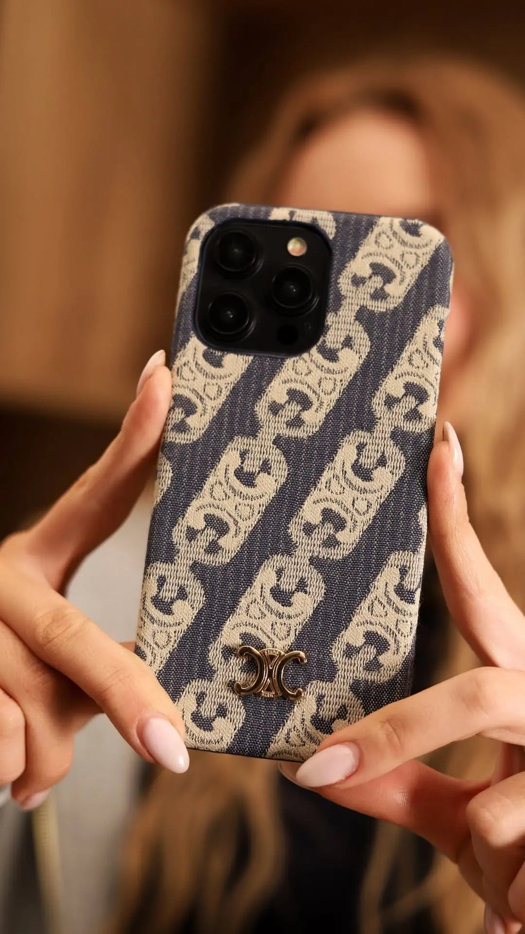 Collection of minimalist luxury iPhone cases in neutral tones, showcasing understated elegance.