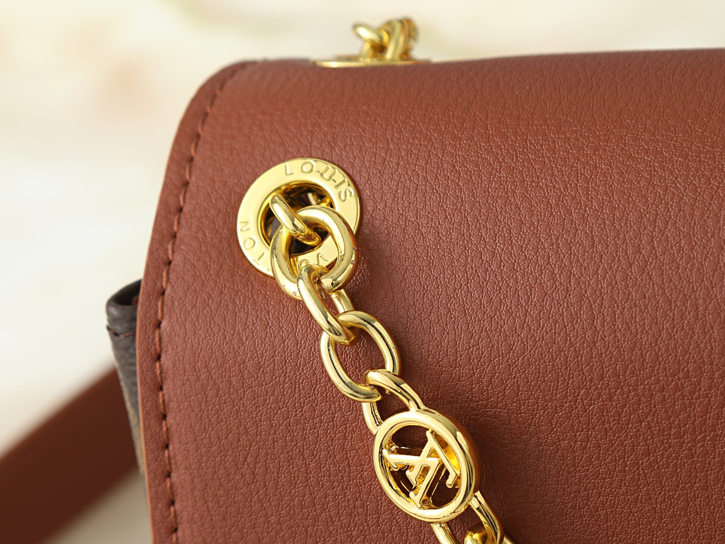 Louis Vuitton Madeleine BB Leather Monogram Handbag