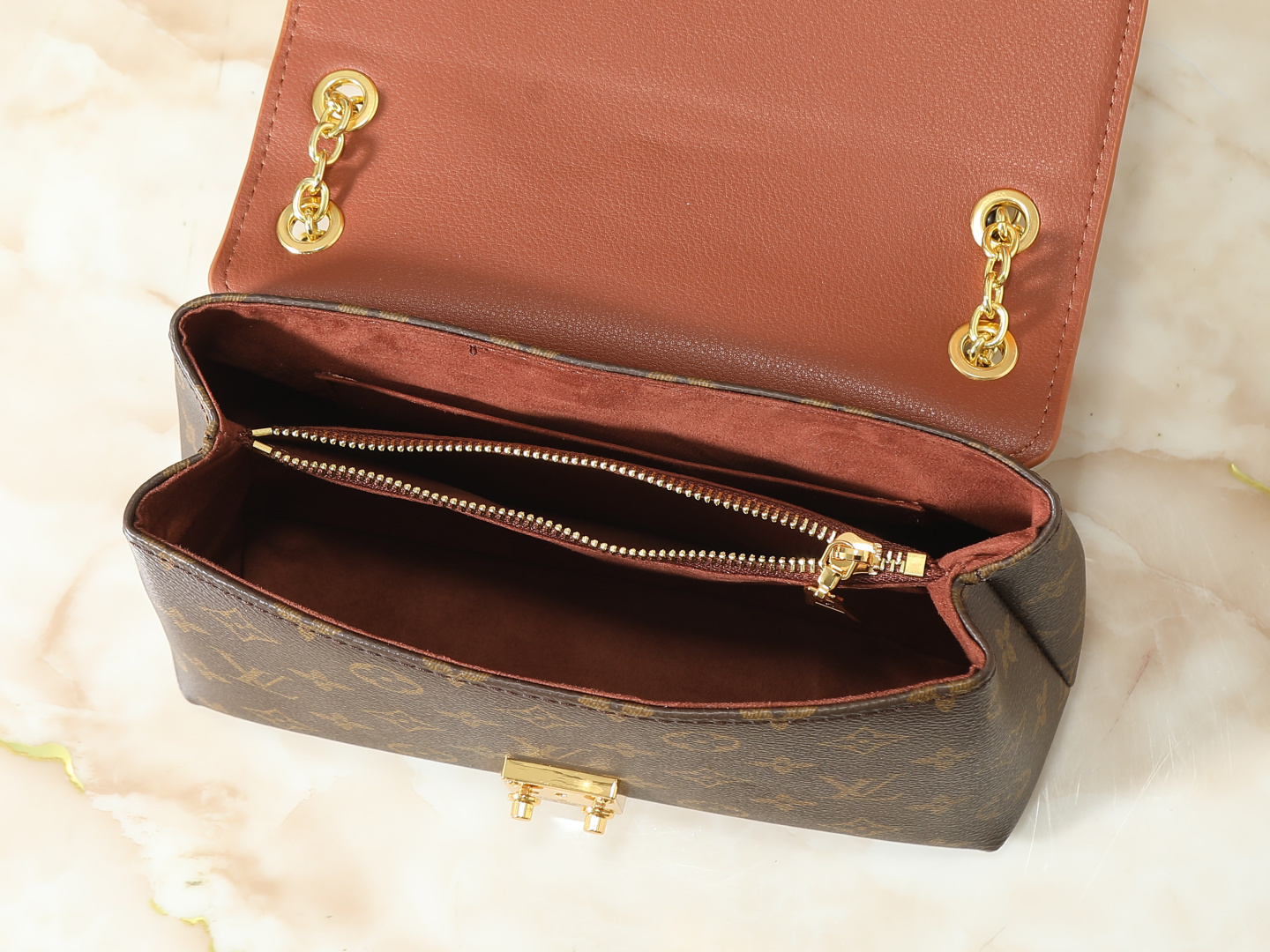 Louis Vuitton Madeleine BB Leather Monogram Handbag