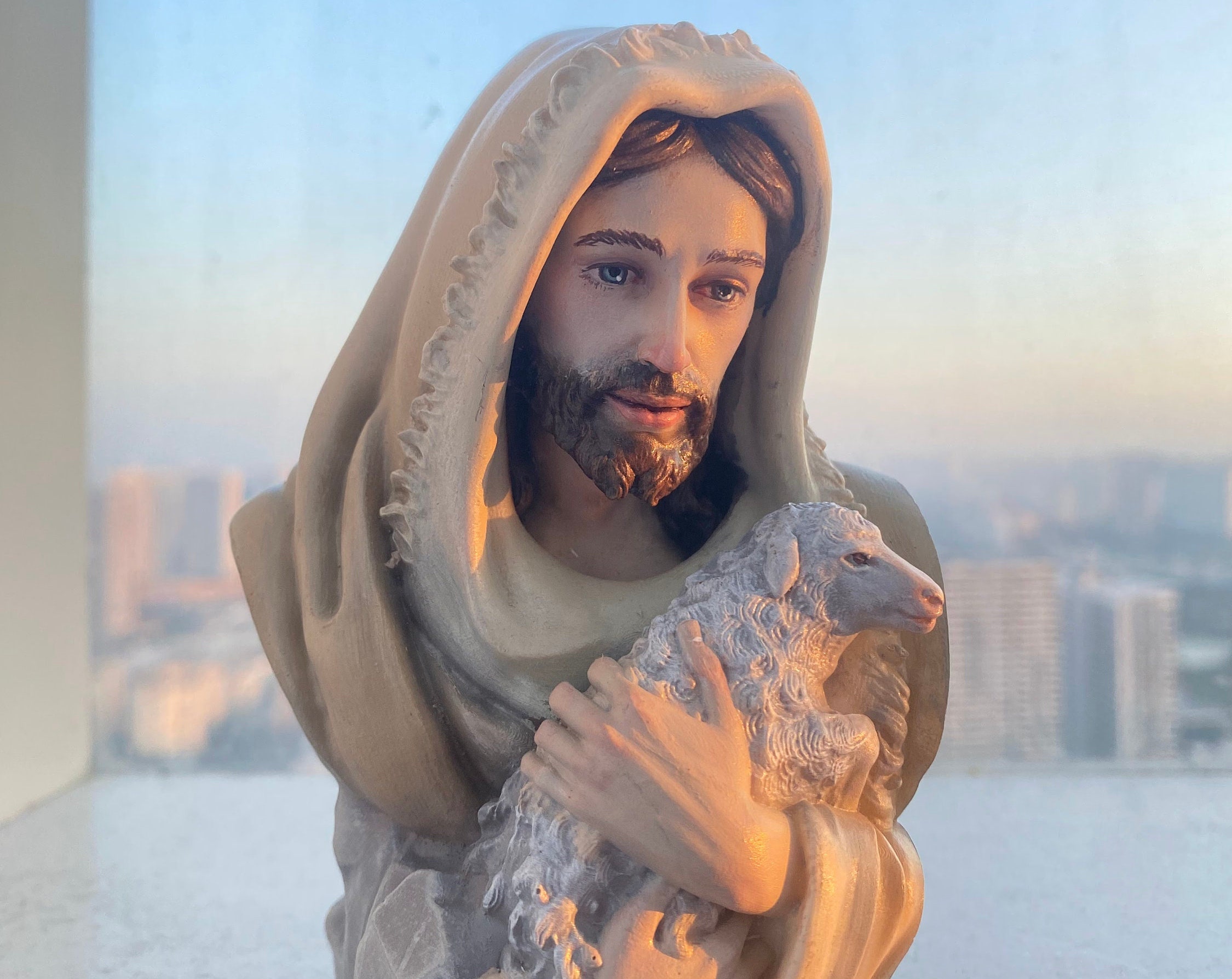 jesus-christ-holding-lamb-statue