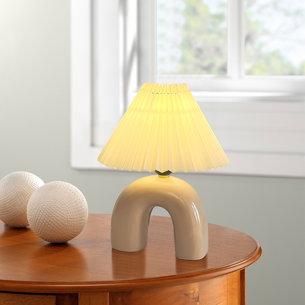 U shaped ceramic lamp on a table