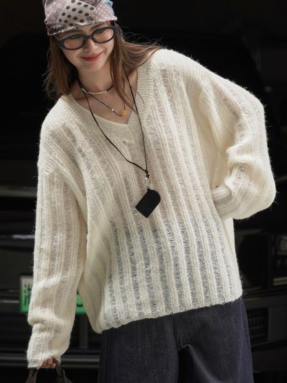 女士春大V領鏤空羊毛毛衣