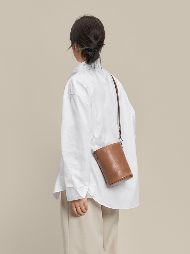 腋下單肩抽繩水桶包