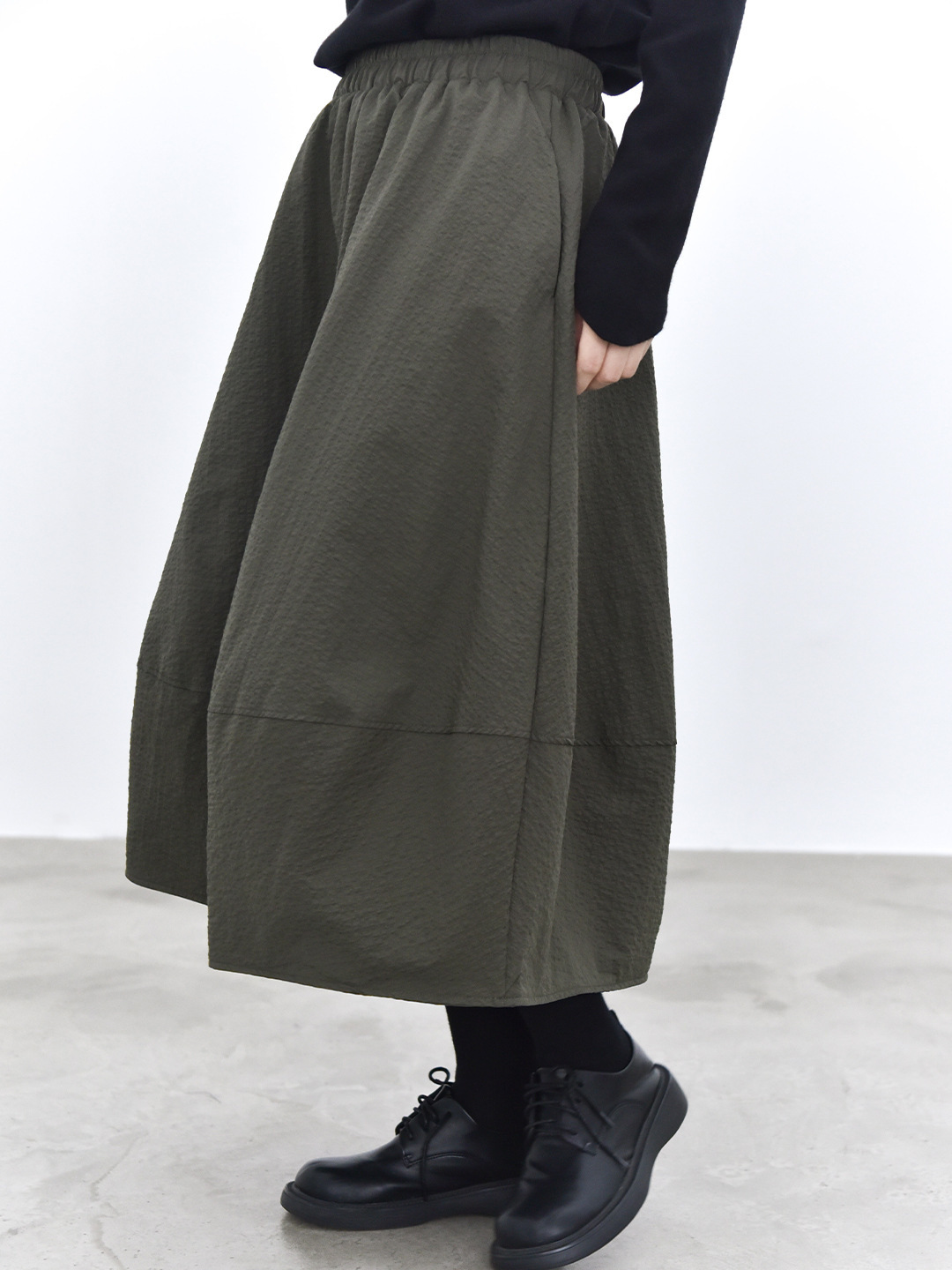 女士冬季立體感廓形夾棉花苞半身裙