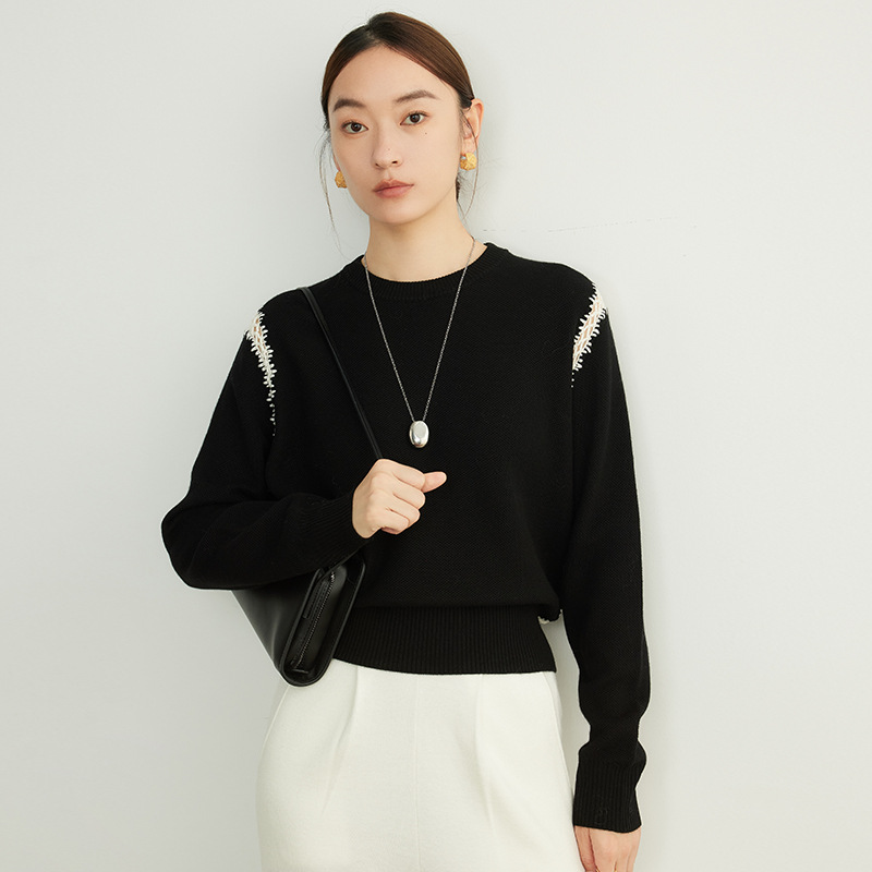 女士秋季赫本風勾花羊毛針織衫