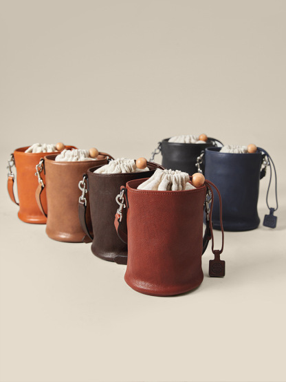 腋下單肩抽繩水桶包