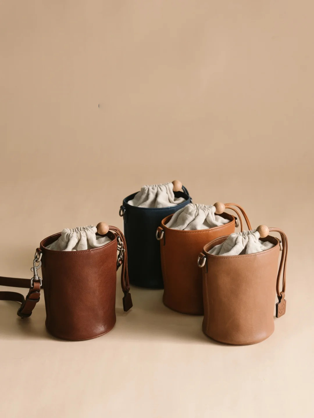 腋下單肩抽繩水桶包