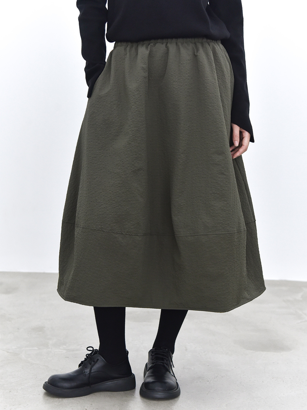 女士冬季立體感廓形夾棉花苞半身裙