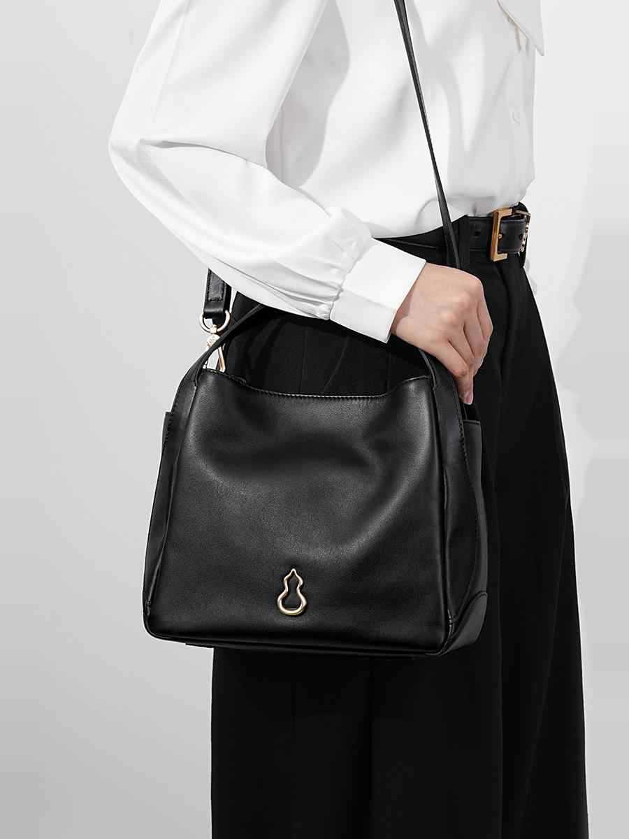 圓滿包頭層牛皮手拎菜籃子