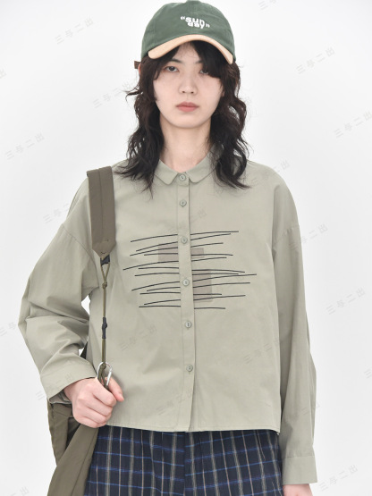 女士春秋簡約素描排線刺繡撞色貼布長袖襯衫