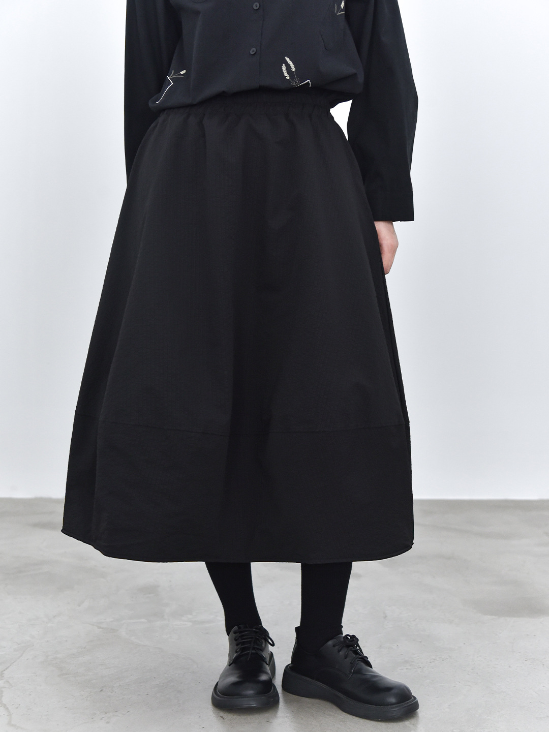 女士冬季立體感廓形夾棉花苞半身裙