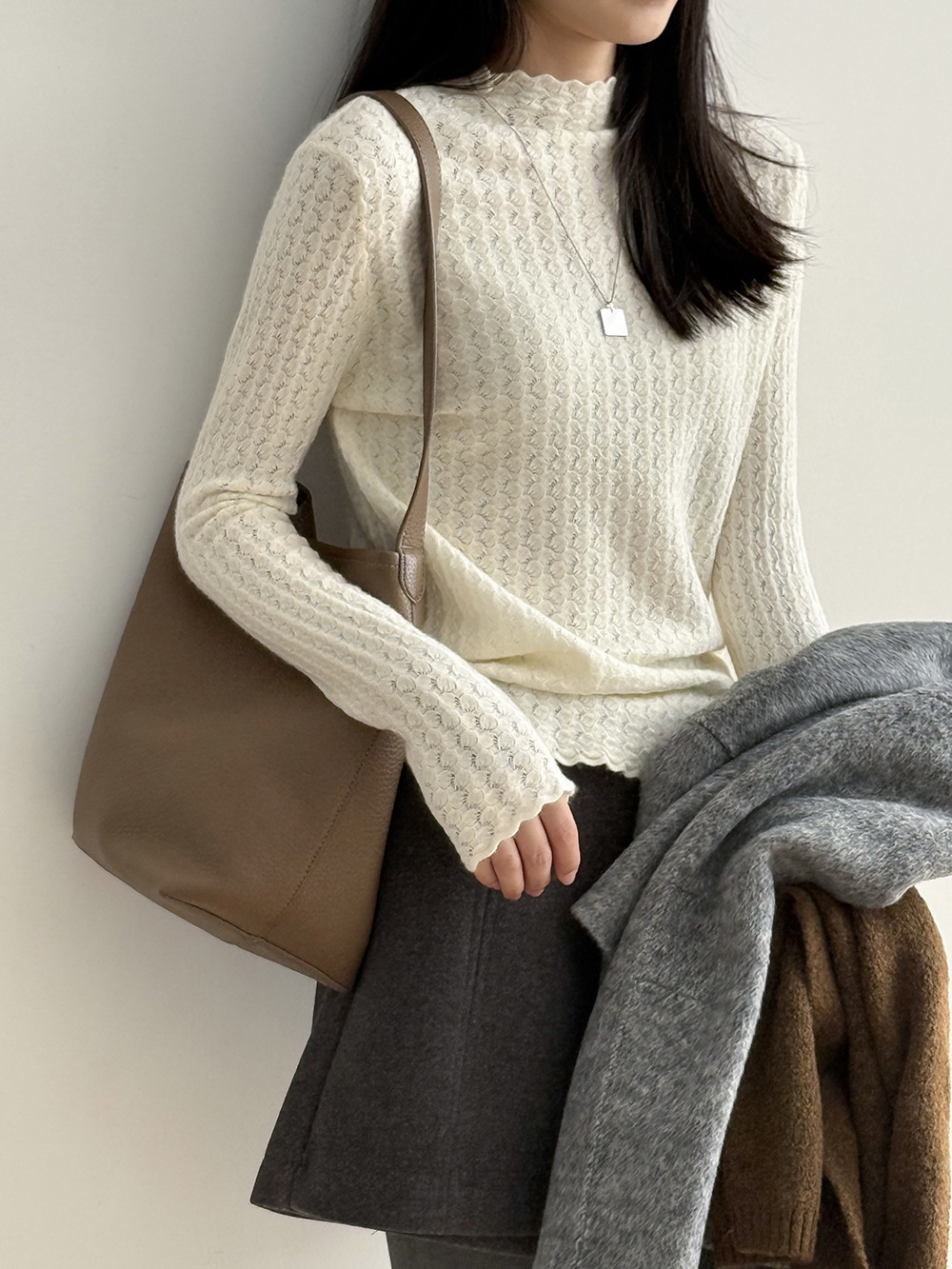 女士秋冬純色半高領鏤空類似針織打底衫