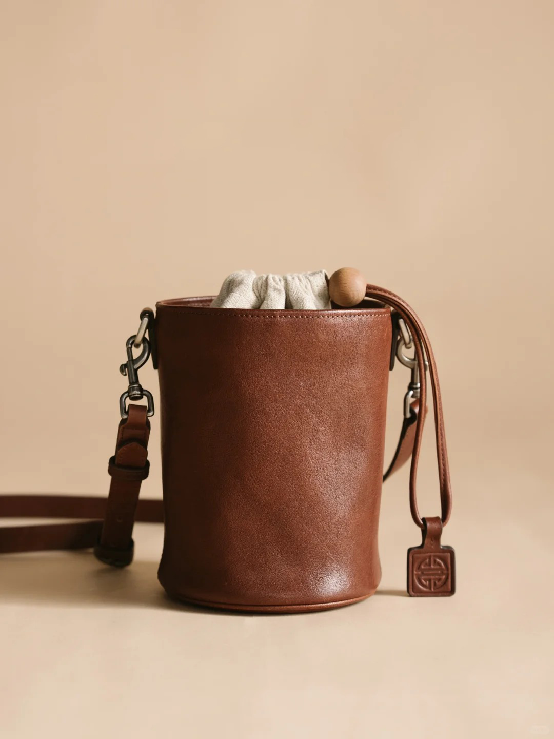 腋下單肩抽繩水桶包