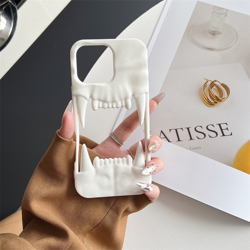 2025 New Cool Hollow Skull Tiger Tooth Shape Mobile Phone Case