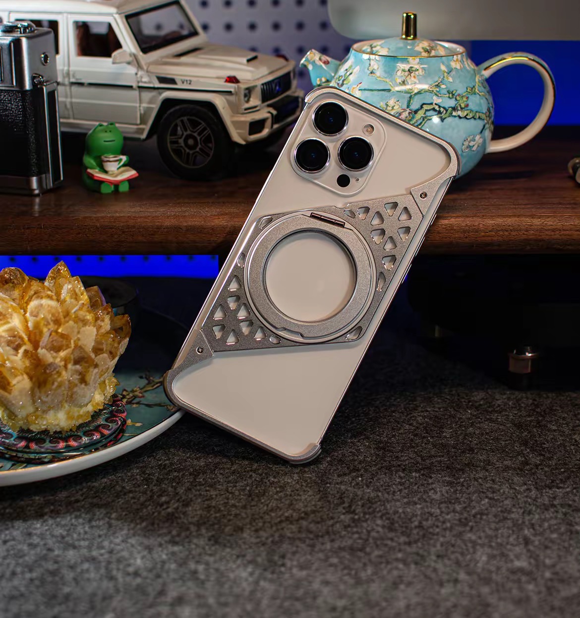 Innovative metal heat dissipation frameless rotating magnetic bracket mobile phone case